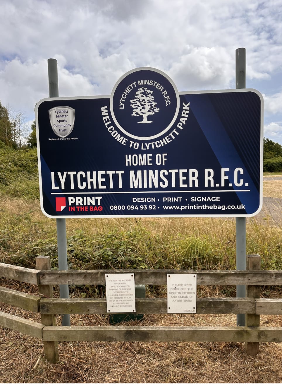 Under Entrance Sign - Board/Banner (1 season)